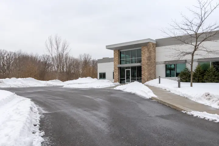 Clear commercial entrance and parking access after snow removal